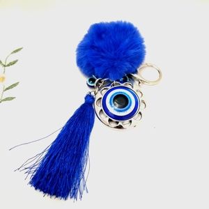 Evil Eye Pom Pom Keychain. Blue. New